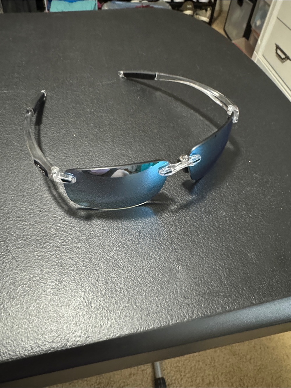 Revo Men's Clear Frame Sunglasses with Blue Mirrored Lenses